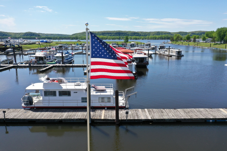 flag winneshiek river marina spring boat boats