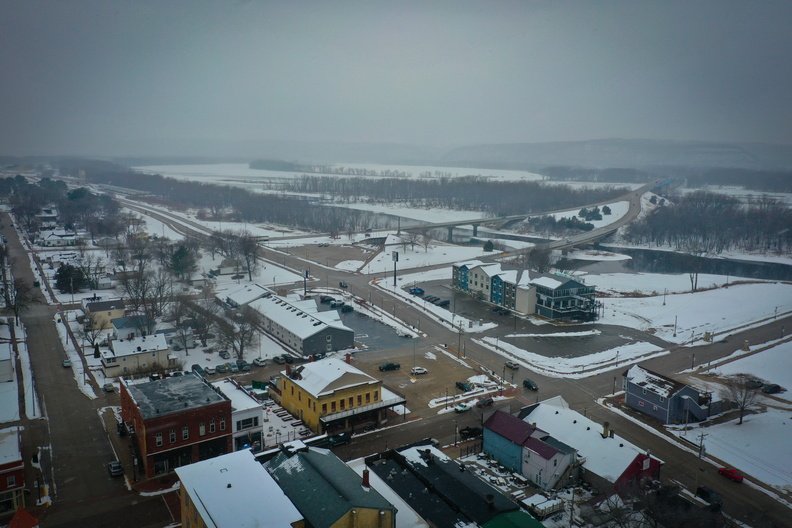 winter downtown snow hotel bridge river