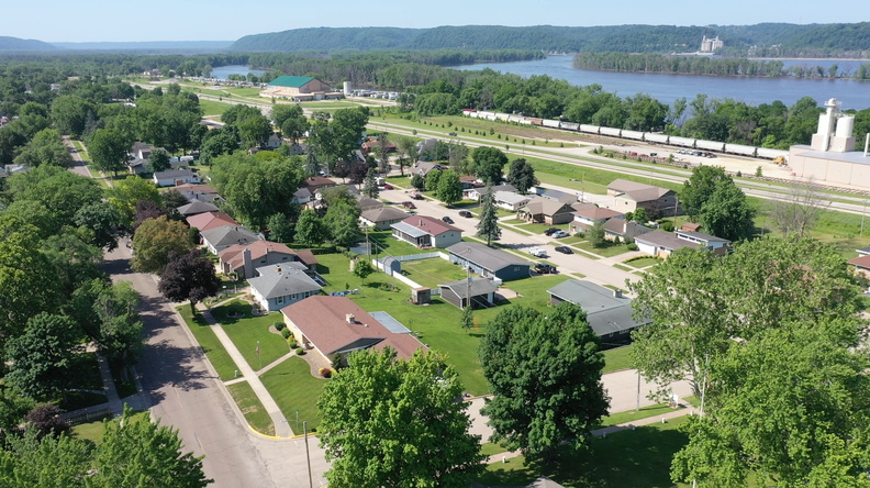 residential neighborhood house river summer